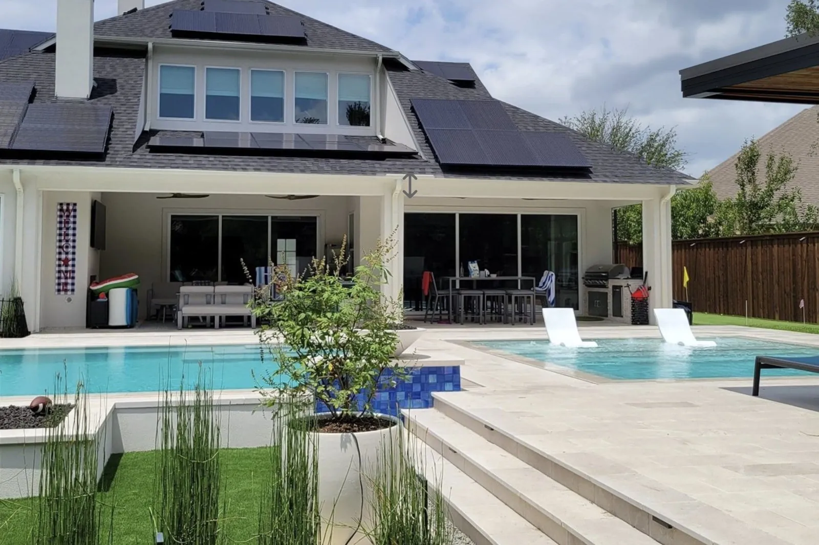 Covered patio with motorized screens fully retracted